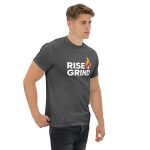 Person wearing fitness motivation t-shirt rise and grind during gym session with layered streetwear

